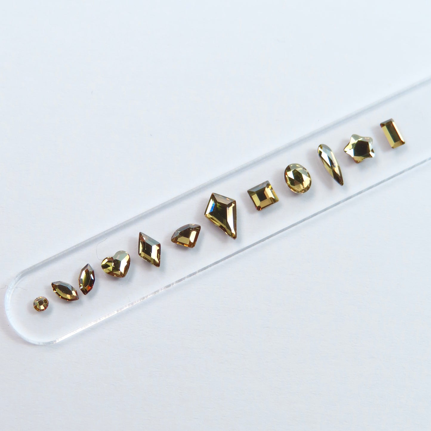 The Essentials SWAROVSKI® - 63 gemas dentales - Dorado