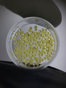Cristales SWAROVSKI® 2058 redondos - Crystal Yellow Ignite