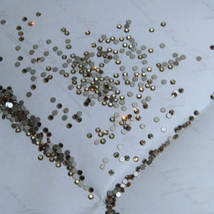 Cristales SWAROVSKI® 2000 redondos - Crystal Golden Shadow - SS3