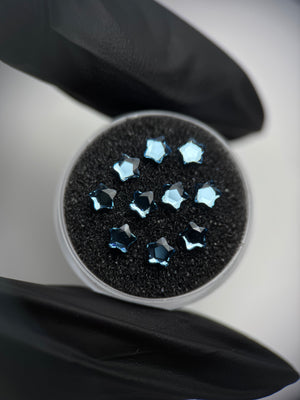 Pack 10 SWAROVSKI® Star Flower Tooth Gems - Aquamarine
