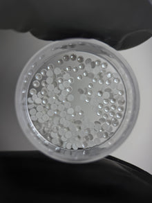 SWAROVSKI® 2058 runde Kristalle - Elektr. Weißes Ignite
