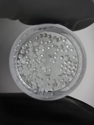 SWAROVSKI® 2058 round crystals - Electr. White Ignite