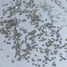 SWAROVSKI® 2058 Runde Zahnsteine ​​- Kristall
