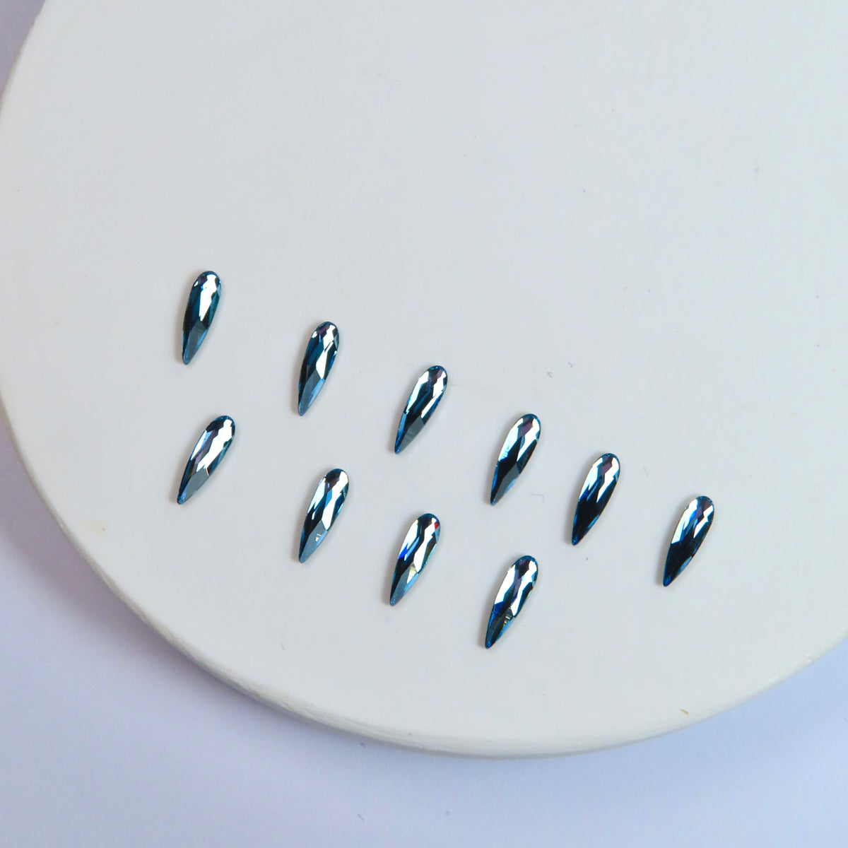 Pack of 10 SWAROVSKI® raindrops - Aquamarine