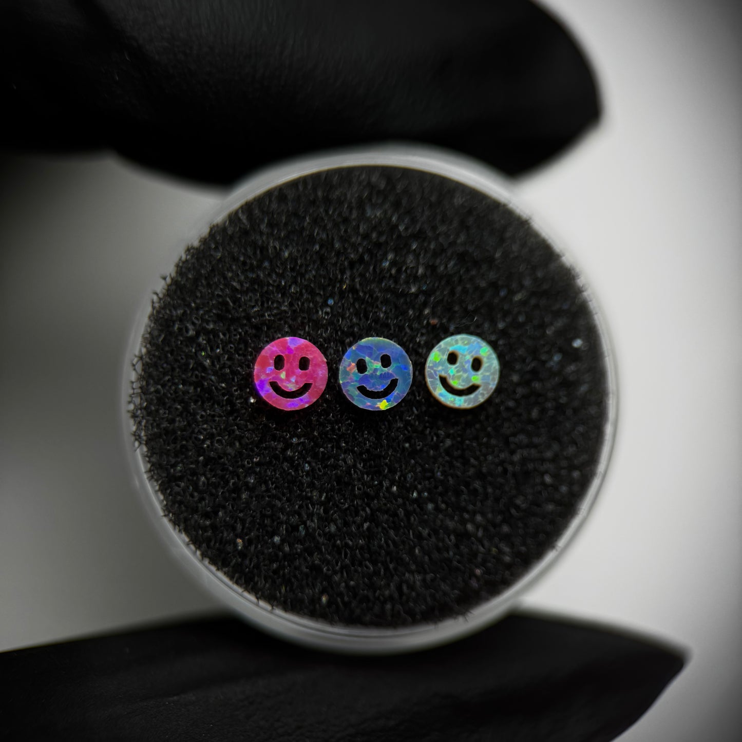Smiley-shaped opal dental gem