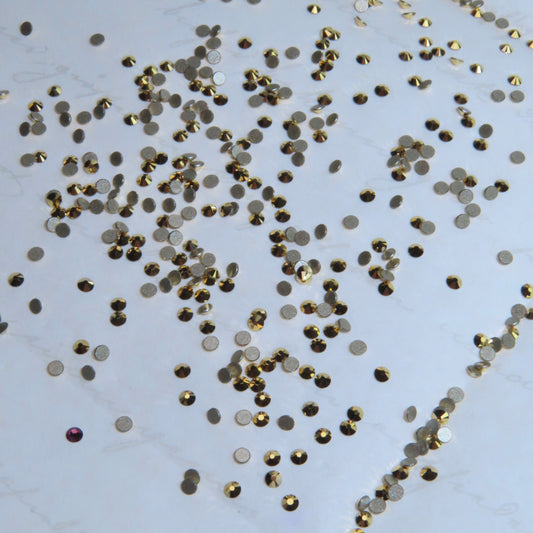 Gemas dentales SWAROVSKI® 2058 redondos - Crystal Aurum