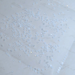 SWAROVSKI® 2058 round crystals - Electr. White Ignite
