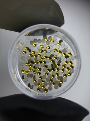 SWAROVSKI® 2058 round crystals - Light Topaz