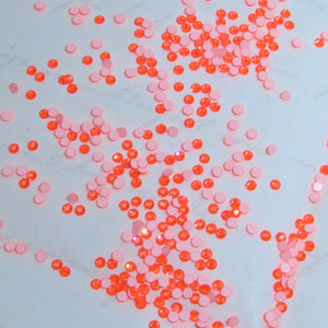 SWAROVSKI® 2058 runde Kristalle - Elektr. Orange Ignite
