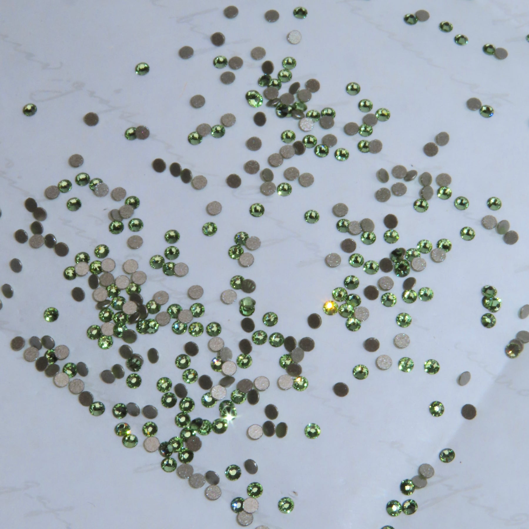SWAROVSKI® 2058 runde Kristalle - Peridot