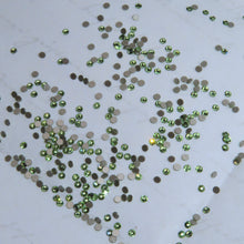 Runde SWAROVSKI® 2058 Kristalle – ReCreated Peridot
