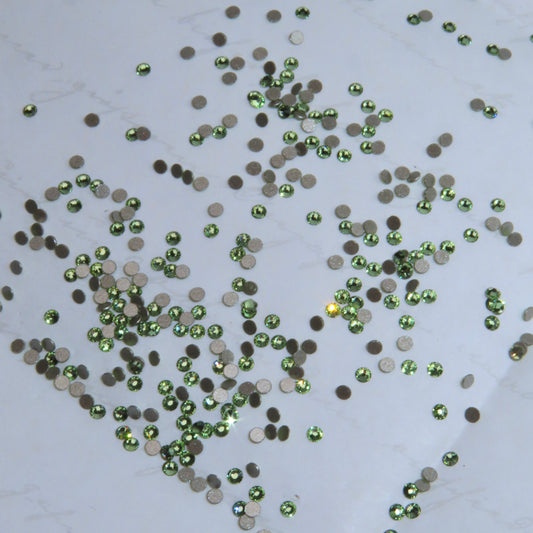 Cristales SWAROVSKI® 2058 redondos - Peridot