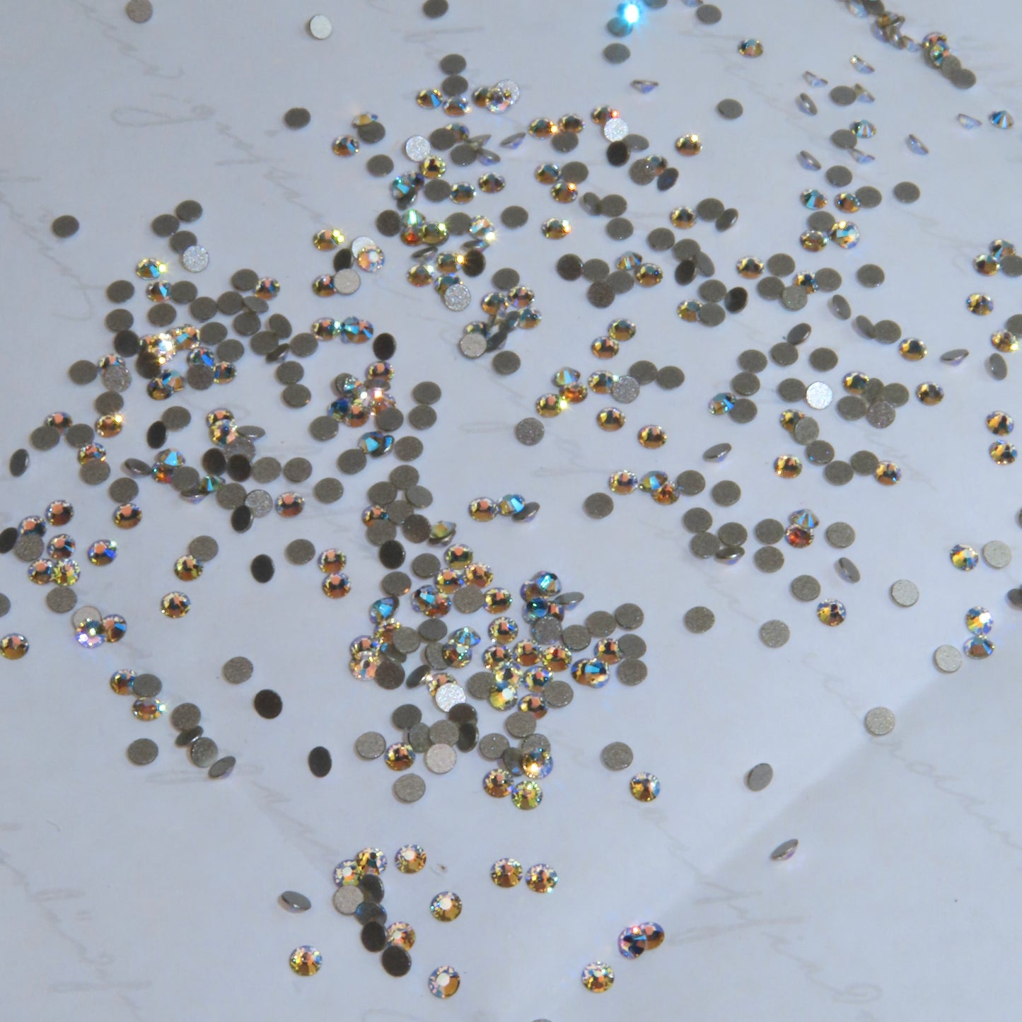 Cristales SWAROVSKI® 2058 redondos - Crystal Shimmer