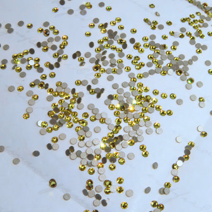 Cristales SWAROVSKI® 2058 redondos - Light Topaz