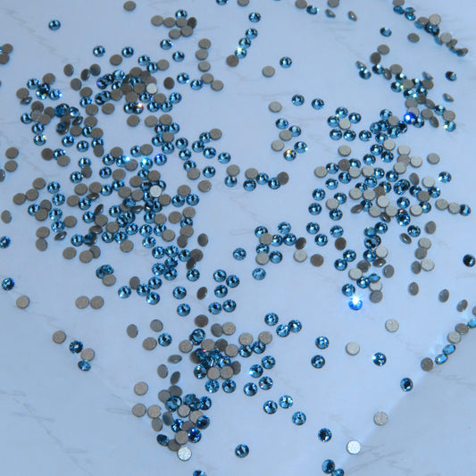 Gemas dentales SWAROVSKI® 2058 redondos - Aquamarine