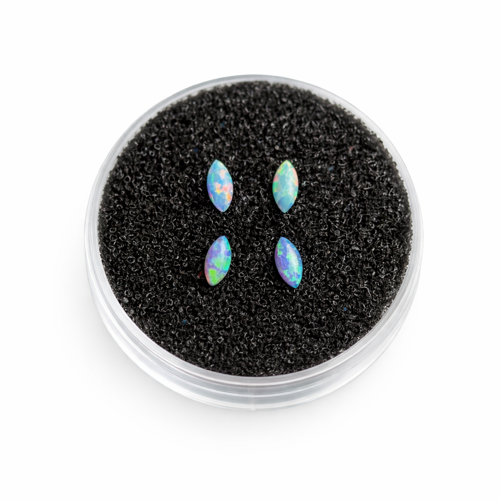 Marquise-shaped opal dental gem