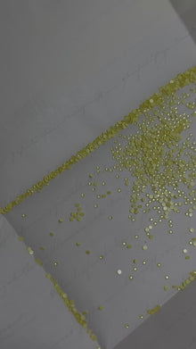 Cristales SWAROVSKI® 2058 redondos - Crystal Yellow Ignite