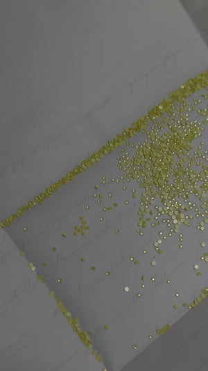 Cristales SWAROVSKI® 2058 redondos - Crystal Yellow Ignite
